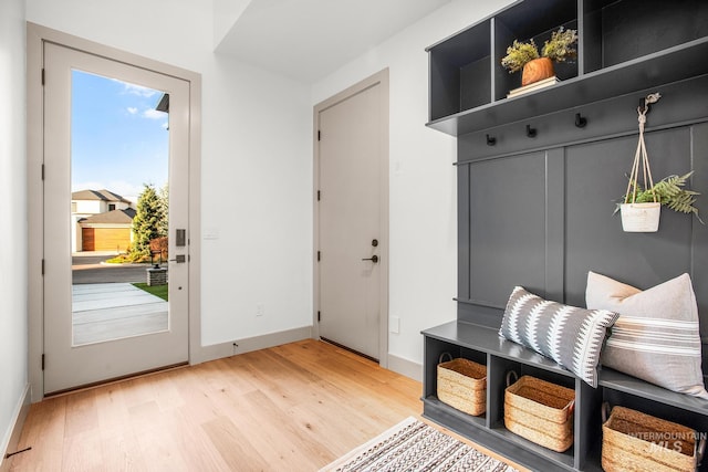 mudroom with hardwood / wood-style flooring