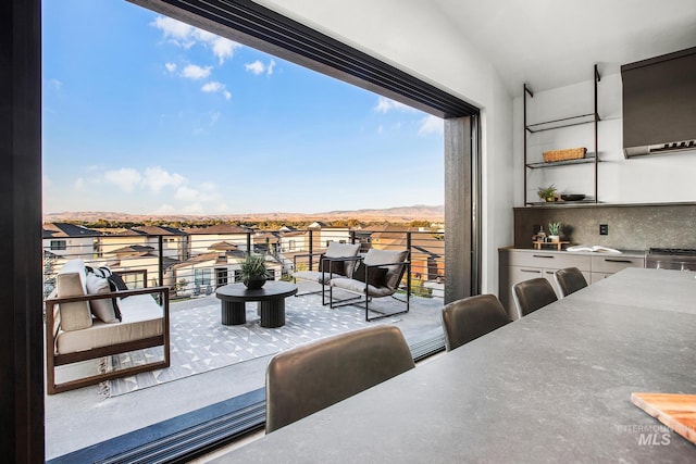 dining space featuring lofted ceiling