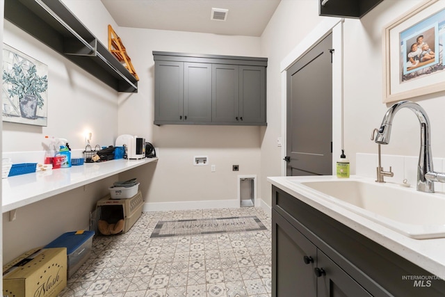 4337 W Ravenna St, Meridian, ID 83646 - laundry area with cabinet space, hookup for an electric dryer, and hookup for a washing machine