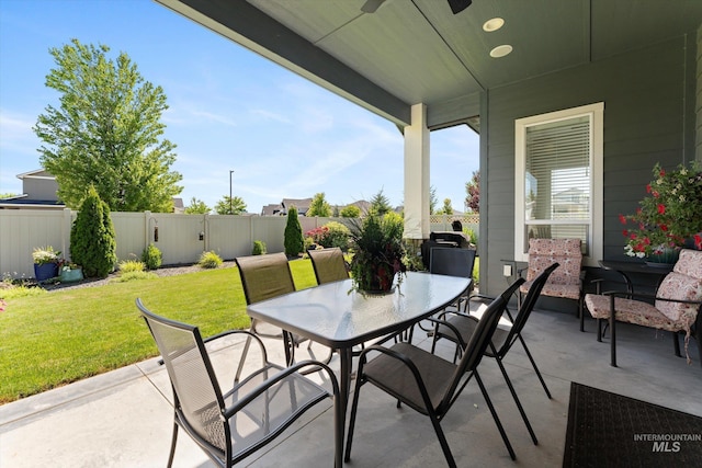 4337 W Ravenna St, Meridian, ID 83646 - fenced backyard featuring outdoor dining area, a patio area, and ceiling fan