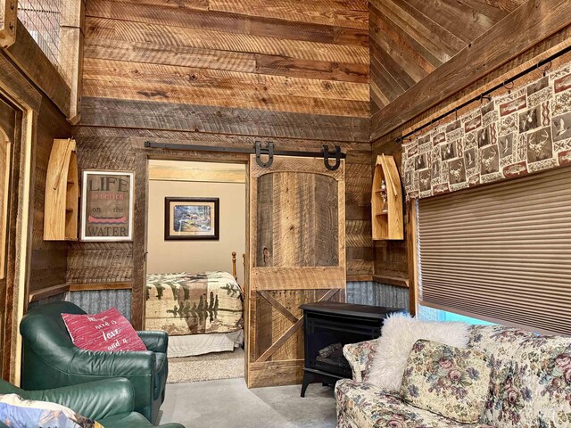 210 Spalding Ave, Winchester, ID 83555 - sitting room featuring wooden walls and concrete floors