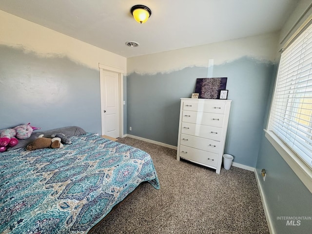 802 S 9th St, Rupert, ID 83350 - carpeted bedroom featuring baseboards