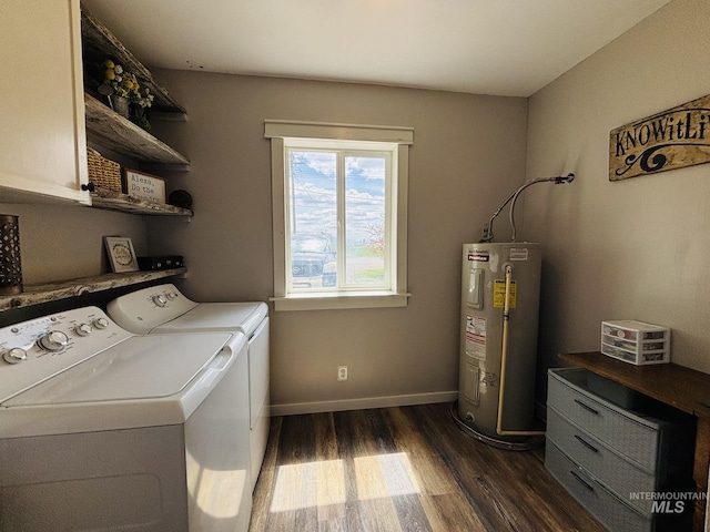 802 S 9th St, Rupert, ID 83350 - washroom featuring cabinet space, electric water heater, washing machine and dryer, dark wood finished floors, and baseboards