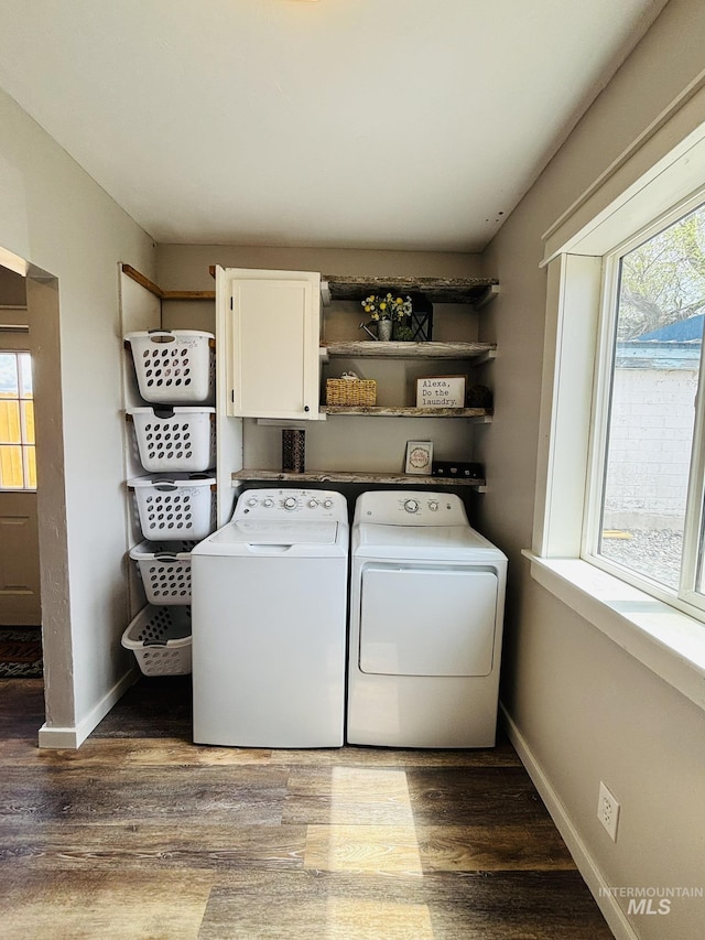 802 S 9th St, Rupert, ID 83350 - laundry room with cabinet space, washing machine and dryer, wood finished floors, and baseboards