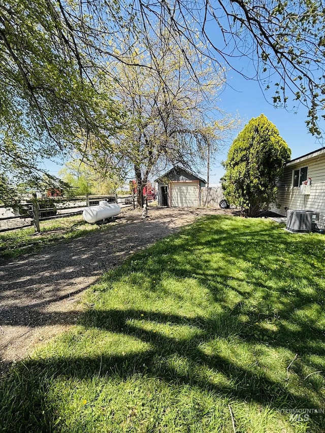 802 S 9th St, Rupert, ID 83350 - view of yard with an outdoor structure and cooling unit