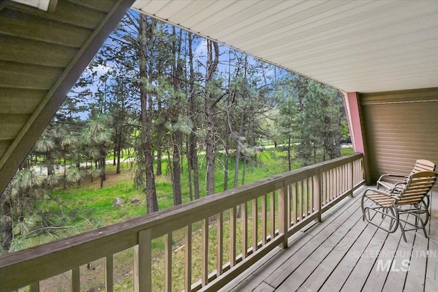 76 W Castle Creek Rd, Garden Valley, ID 83622 - wooden deck with view of wooded area