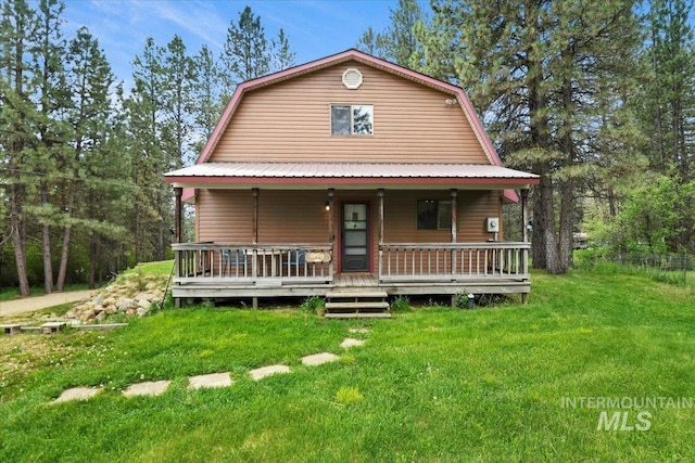 76 W Castle Creek Rd, Garden Valley, ID 83622 - colonial inspired home featuring a gambrel roof and a front yard
