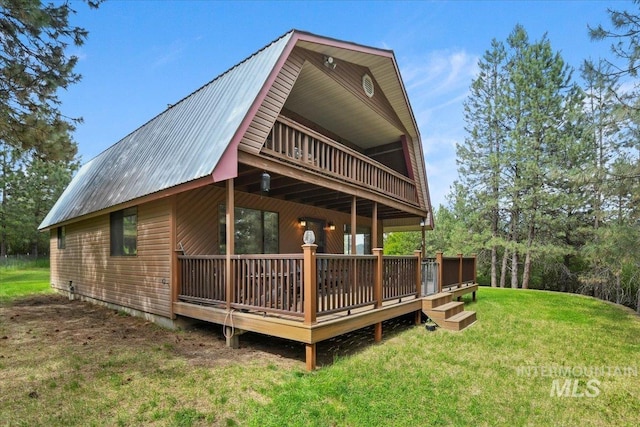 76 W Castle Creek Rd, Garden Valley, ID 83622 - back of house featuring a yard, metal roof, and a deck