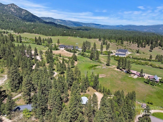 76 W Castle Creek Rd, Garden Valley, ID 83622 - aerial view of property's location featuring a mountain backdrop, a forest, and rural landscape