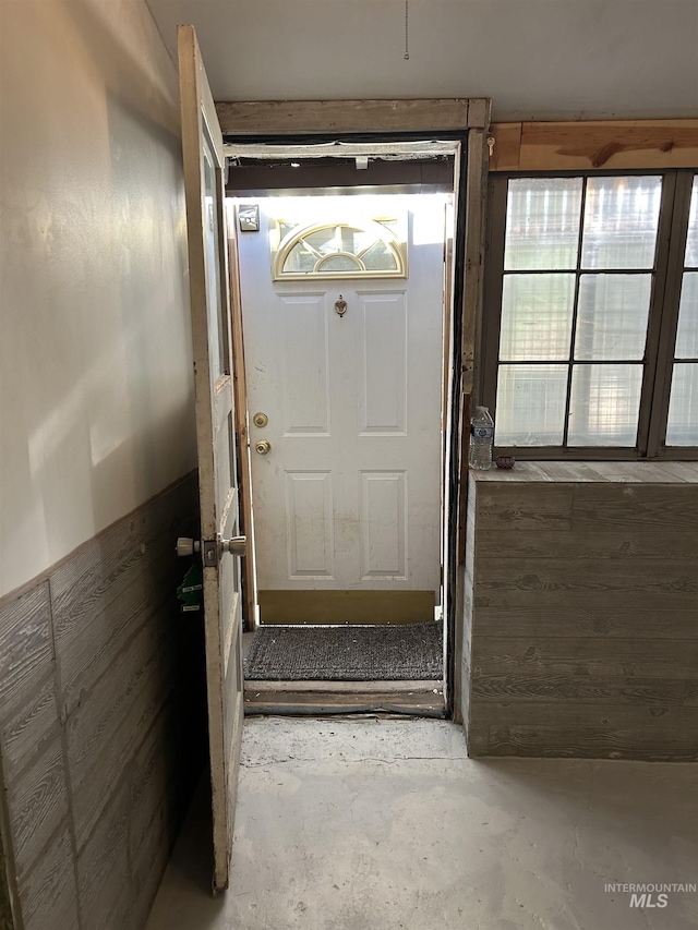 doorway featuring concrete flooring