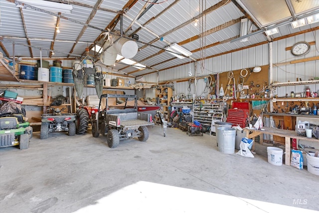 520 9th St, Middleton, ID 83644 - garage featuring metal wall and a workshop area