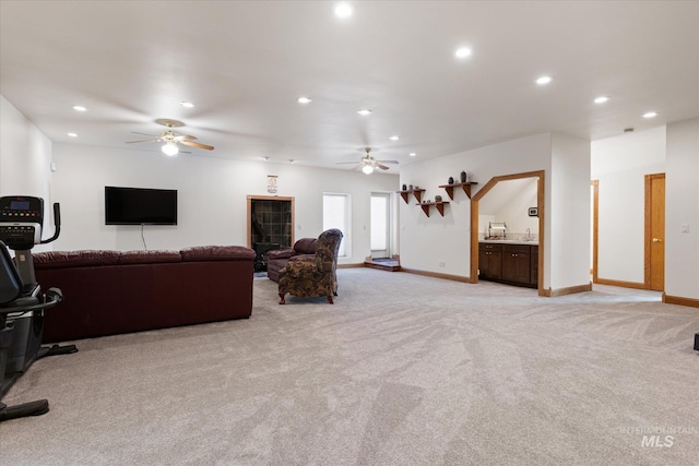 520 9th St, Middleton, ID 83644 - living room featuring recessed lighting, light carpet, baseboards, and ceiling fan