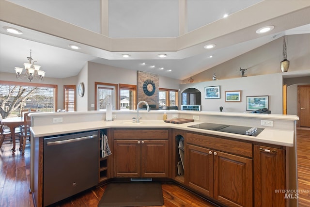 520 9th St, Middleton, ID 83644 - kitchen with light countertops, a sink, dishwasher, black electric cooktop, and dark wood-style flooring