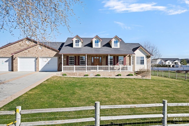 520 9th St, Middleton, ID 83644 - view of front of home featuring concrete driveway, fence, a front lawn, covered porch, and brick siding