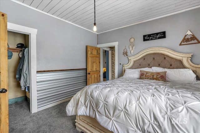 353 7th Ave E, Twin Falls, ID 83301 - bedroom with carpet, wood ceiling, crown molding, a walk in closet, and a closet