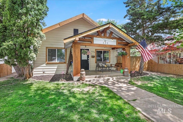 353 7th Ave E, Twin Falls, ID 83301 - rear view of house with a porch