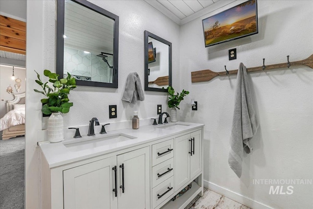 353 7th Ave E, Twin Falls, ID 83301 - ensuite bathroom with double vanity and baseboards