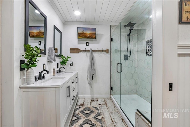 353 7th Ave E, Twin Falls, ID 83301 - bathroom featuring double vanity, a shower stall, wood ceiling, recessed lighting, and marble look tiles