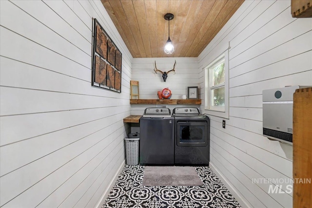 353 7th Ave E, Twin Falls, ID 83301 - washroom with independent washer and dryer, wood ceiling, wooden walls, heating unit, and baseboards
