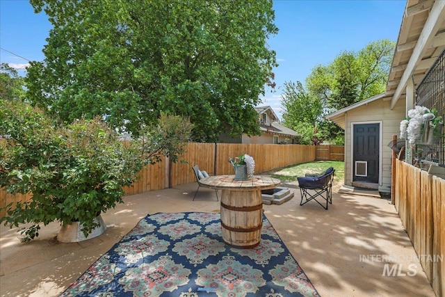 353 7th Ave E, Twin Falls, ID 83301 - fenced backyard with a patio