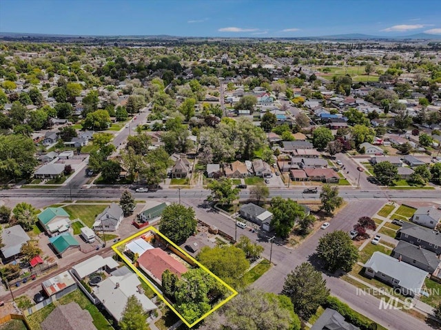 353 7th Ave E, Twin Falls, ID 83301 - aerial perspective of suburban area with property boundaries highlighted