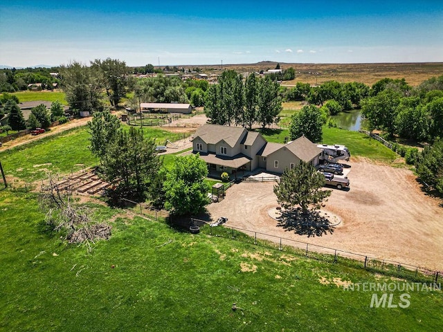 drone / aerial view with a water view and a rural view