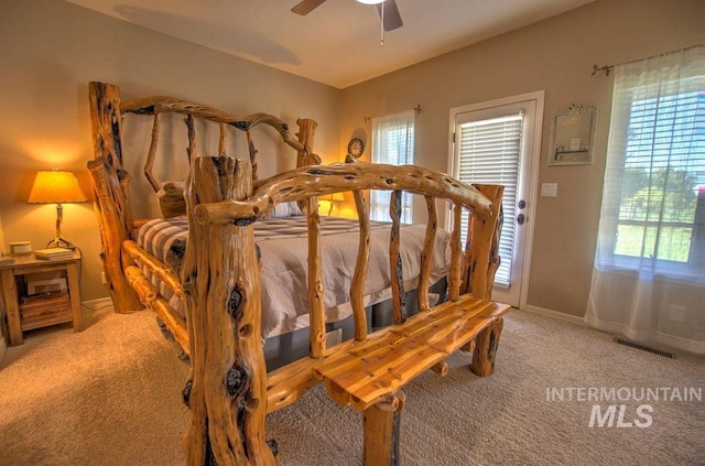 carpeted bedroom featuring ceiling fan