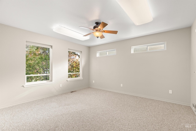 3017 Cypress St, Lewiston, ID 83501 - unfurnished room with plenty of natural light, a ceiling fan, and carpet flooring