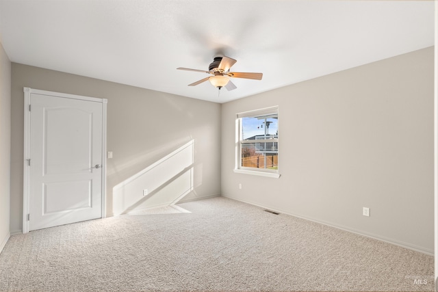 3017 Cypress St, Lewiston, ID 83501 - spare room featuring ceiling fan, carpet, and baseboards