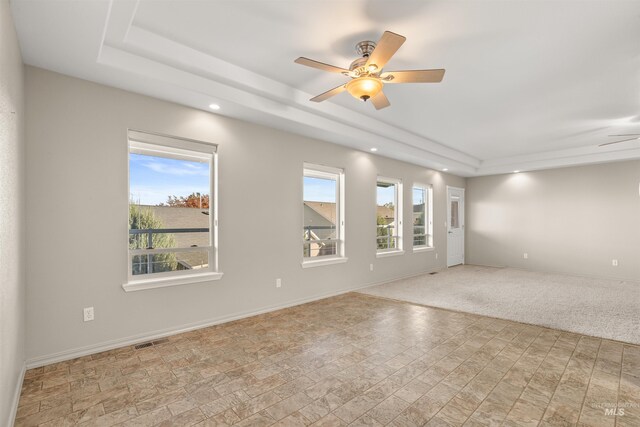 3017 Cypress St, Lewiston, ID 83501 - unfurnished room with a tray ceiling, a ceiling fan, recessed lighting, and baseboards