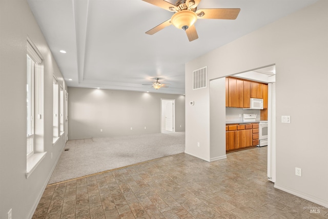 3017 Cypress St, Lewiston, ID 83501 - unfurnished living room featuring ceiling fan, baseboards, and recessed lighting