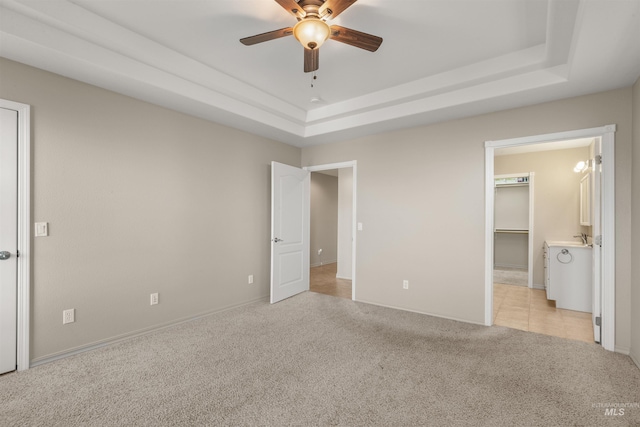 3017 Cypress St, Lewiston, ID 83501 - unfurnished bedroom featuring light colored carpet, a raised ceiling, and baseboards