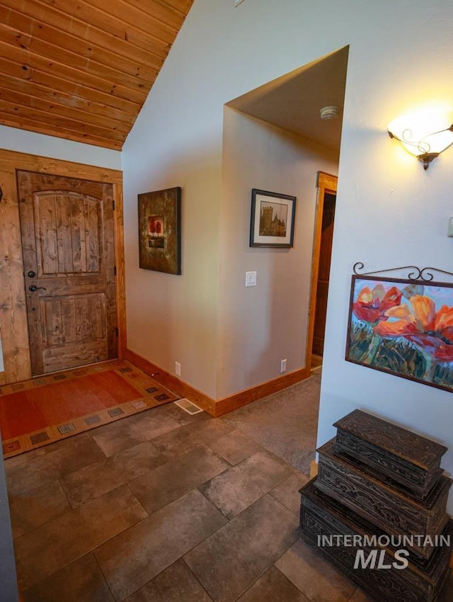 986 Valley Rim Rd, Mccall, ID 83638 - hallway with lofted ceiling, baseboards, and wood ceiling