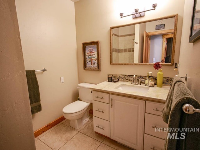986 Valley Rim Rd, Mccall, ID 83638 - bathroom featuring vanity, toilet, a shower, and tile patterned floors
