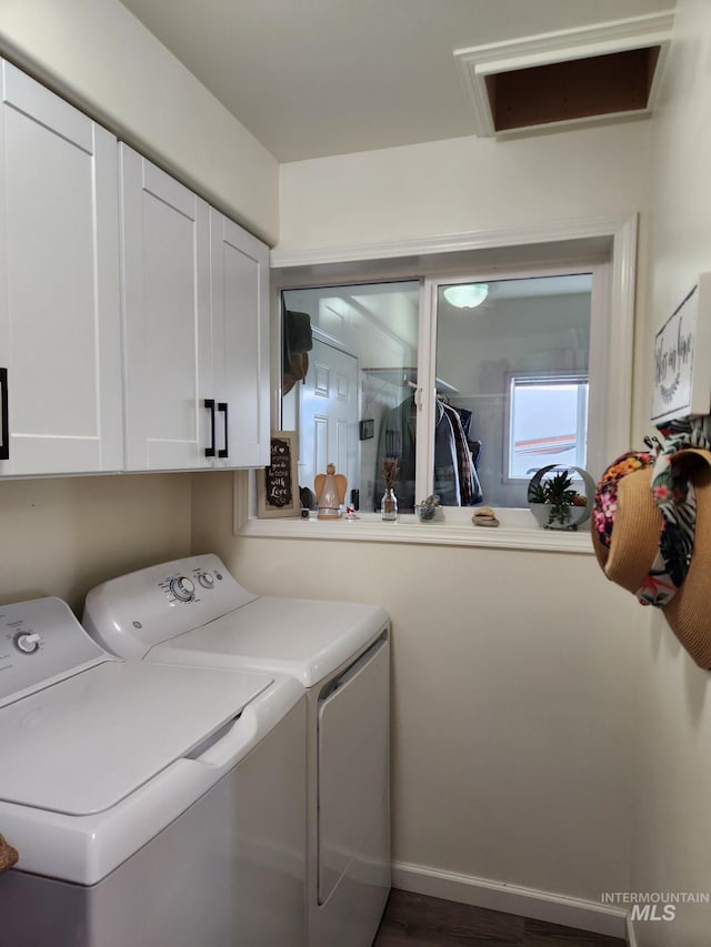 232 Camas Rd, Grangeville, ID 83530 - laundry room featuring washer and clothes dryer, cabinet space, and attic access