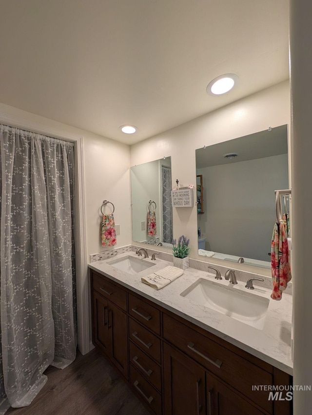 232 Camas Rd, Grangeville, ID 83530 - bathroom with wood finished floors and double vanity