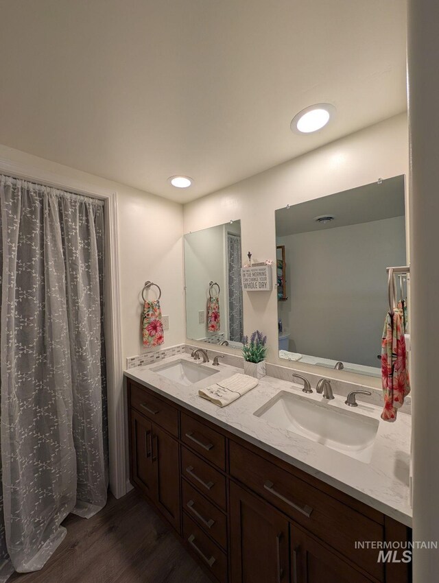 232 Camas Rd, Grangeville, ID 83530 - bathroom with wood finished floors and double vanity