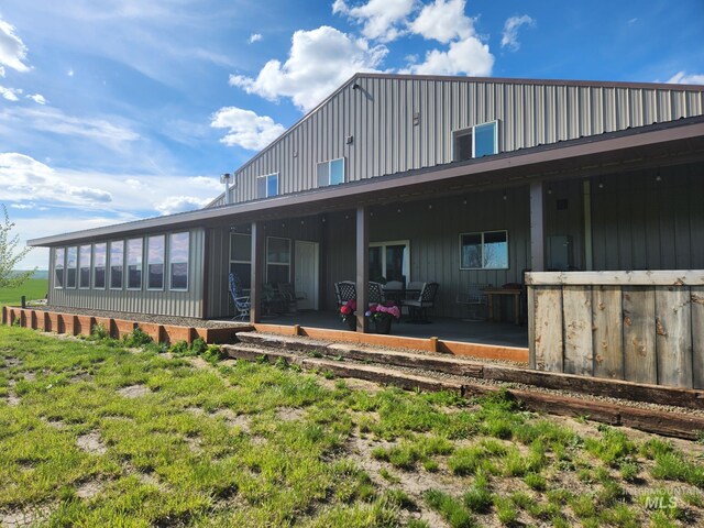 232 Camas Rd, Grangeville, ID 83530 - back of house featuring a patio area and board and batten siding