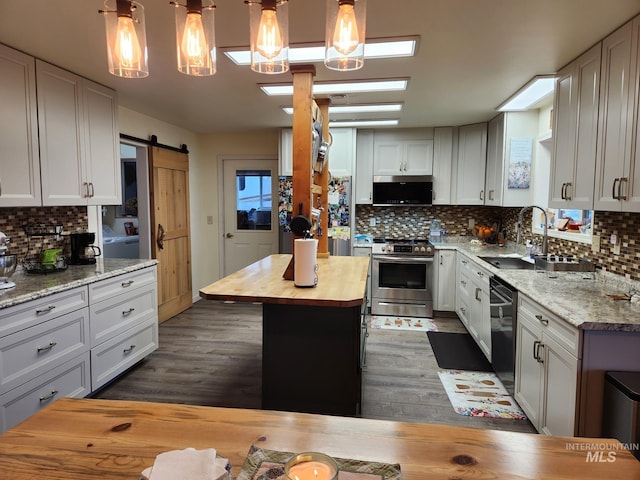 232 Camas Rd, Grangeville, ID 83530 - kitchen featuring butcher block countertops, a sink, electric stove, and tasteful backsplash