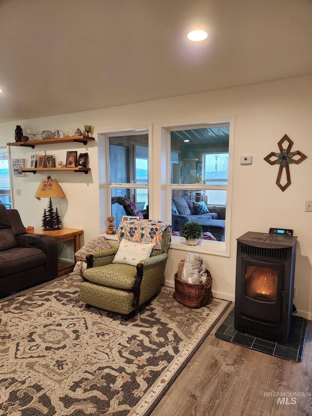 232 Camas Rd, Grangeville, ID 83530 - living area featuring recessed lighting, baseboards, wood finished floors, and a wood stove