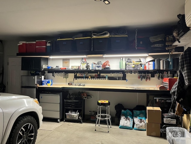 garage featuring freestanding refrigerator