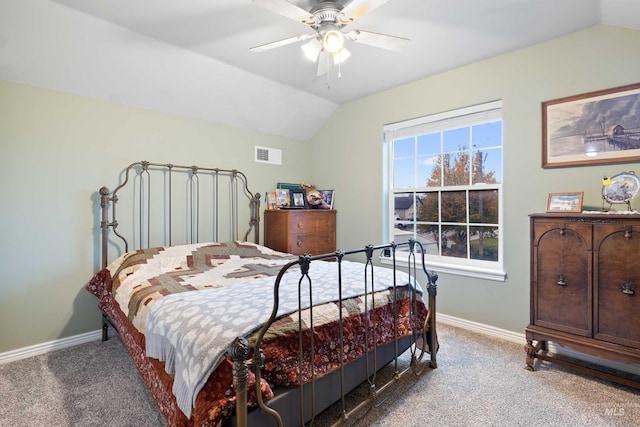 bedroom with lofted ceiling, carpet flooring, baseboards, and a ceiling fan