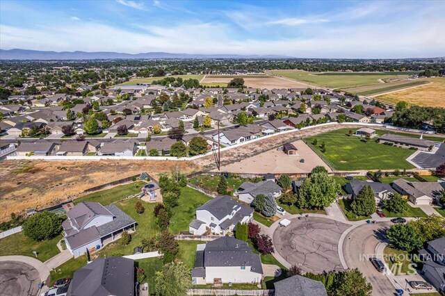555 W Mulberry Loop, Nampa, ID 83686 - aerial view of property and surrounding area with nearby suburban area