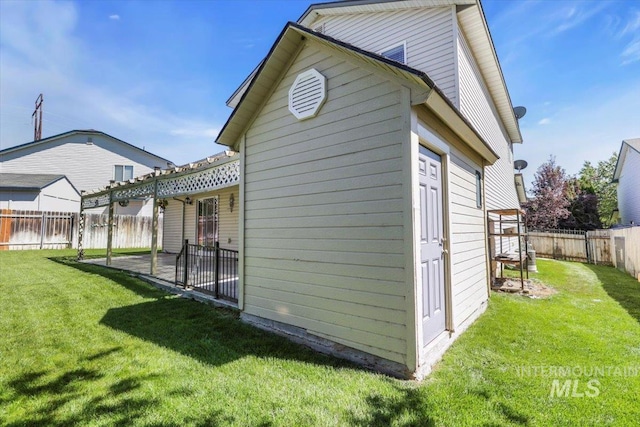 555 W Mulberry Loop, Nampa, ID 83686 - rear view of property with a fenced backyard and a patio area
