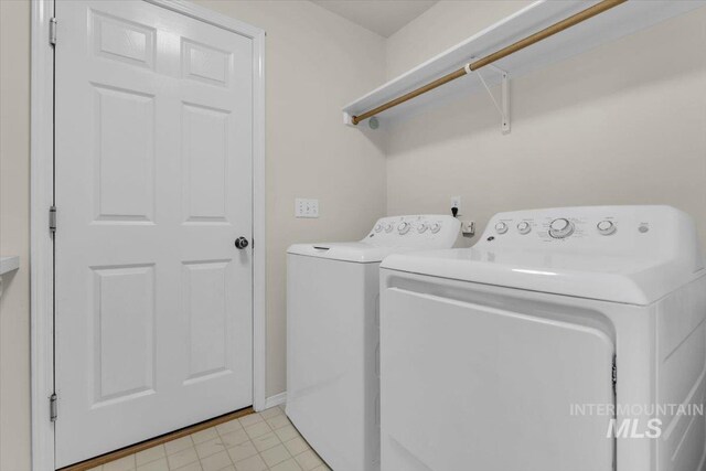 555 W Mulberry Loop, Nampa, ID 83686 - washroom with independent washer and dryer and baseboards