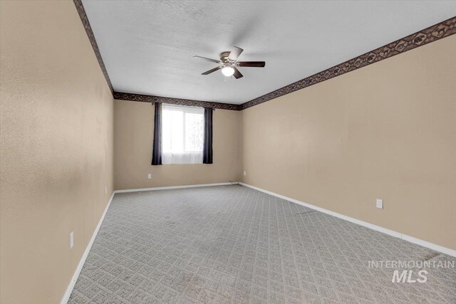 555 W Mulberry Loop, Nampa, ID 83686 - carpeted empty room featuring ceiling fan and a textured ceiling