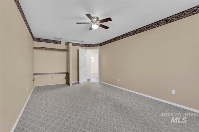 555 W Mulberry Loop, Nampa, ID 83686 - carpeted empty room featuring ceiling fan and baseboards