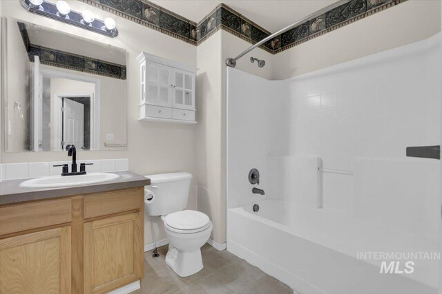 555 W Mulberry Loop, Nampa, ID 83686 - bathroom with vanity, shower / tub combination, and tile patterned flooring
