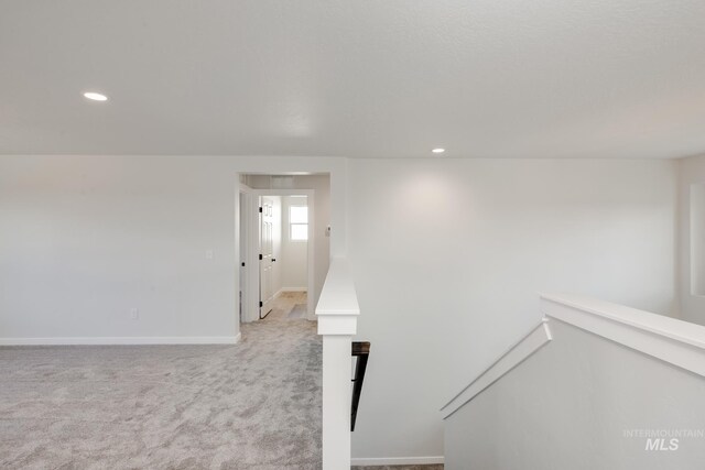 11075 W Windmill Way, Nampa, ID 83651 - interior space featuring light carpet, recessed lighting, and baseboards