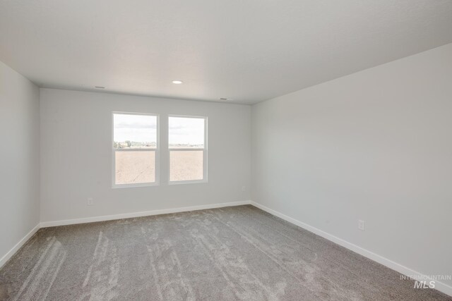 11075 W Windmill Way, Nampa, ID 83651 - carpeted spare room featuring baseboards and recessed lighting